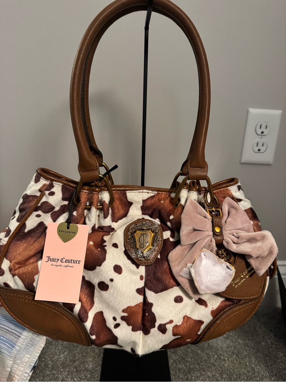 Juicy Couture Brown & White Cowhide-Print  with Bow Charm hobo Romance